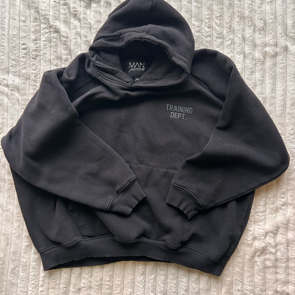 Man active oversized black hoodie